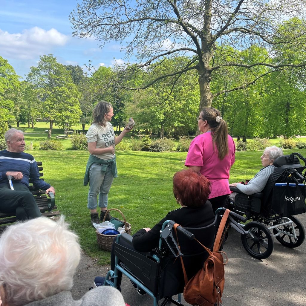 Annie Berrington leading nature connection activities with a group of older people from Herncliffe Care Home, Keighley